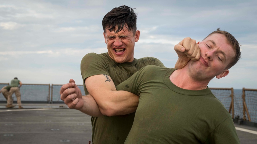 Marines get sprayed with OC on the flight deck