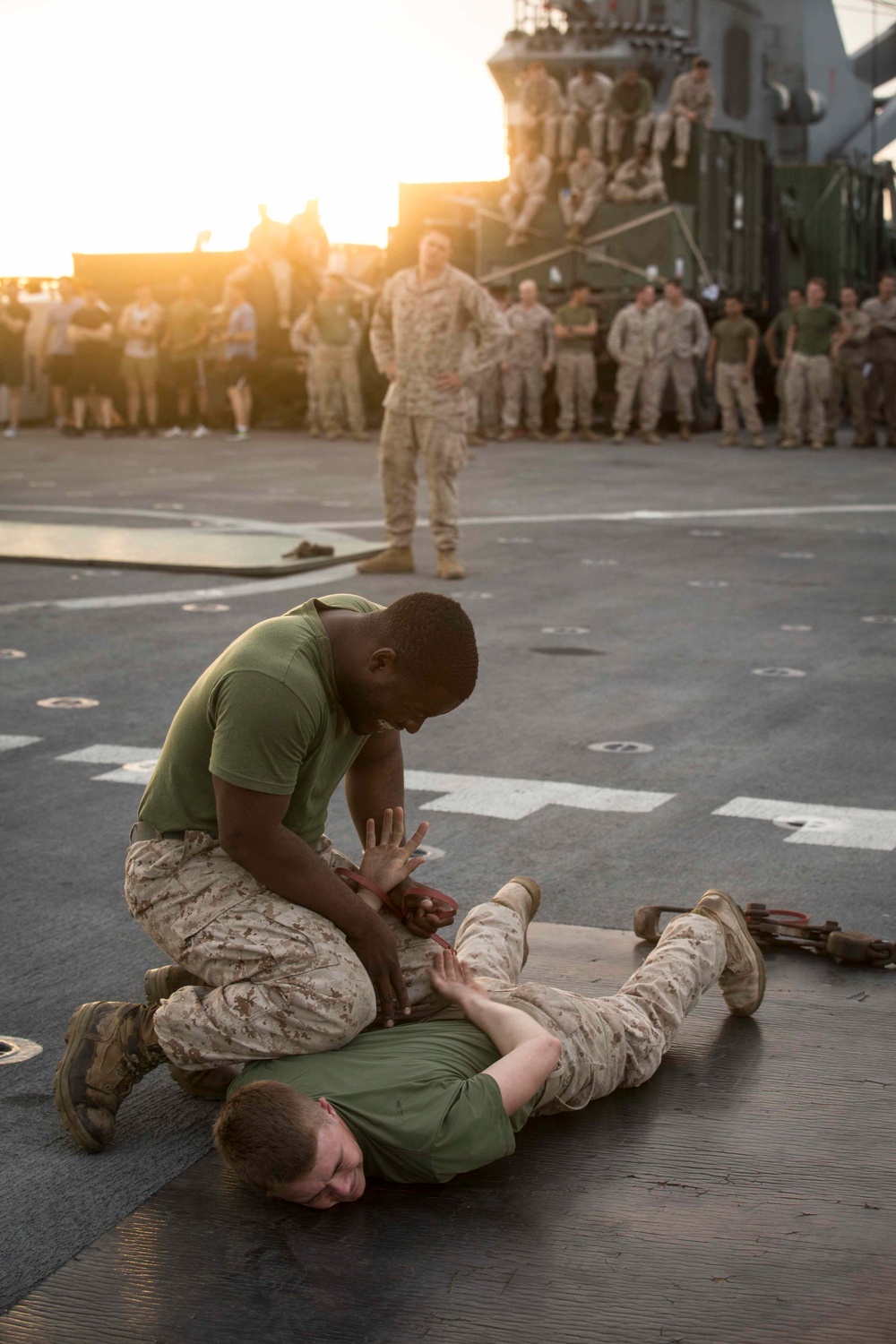 Marines get sprayed with OC on the flight deck