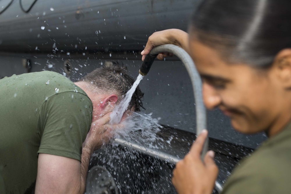 Marines get sprayed with OC on the flight deck