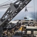 U.S. Marines and Sailors resupply at sea