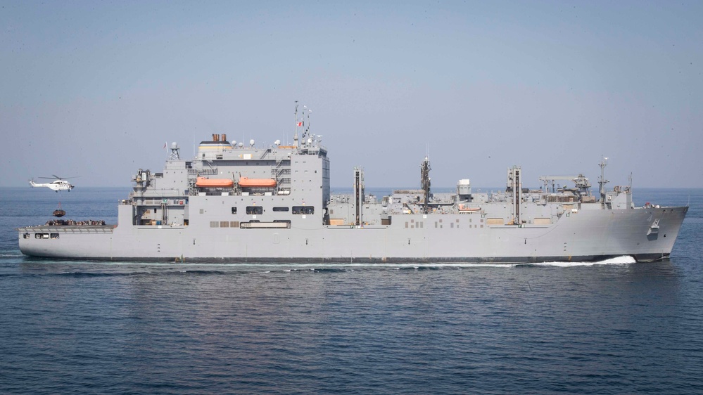 U.S. Marines and Sailors resupply at sea