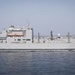 U.S. Marines and Sailors resupply at sea