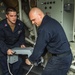 Sailors Move Equipment