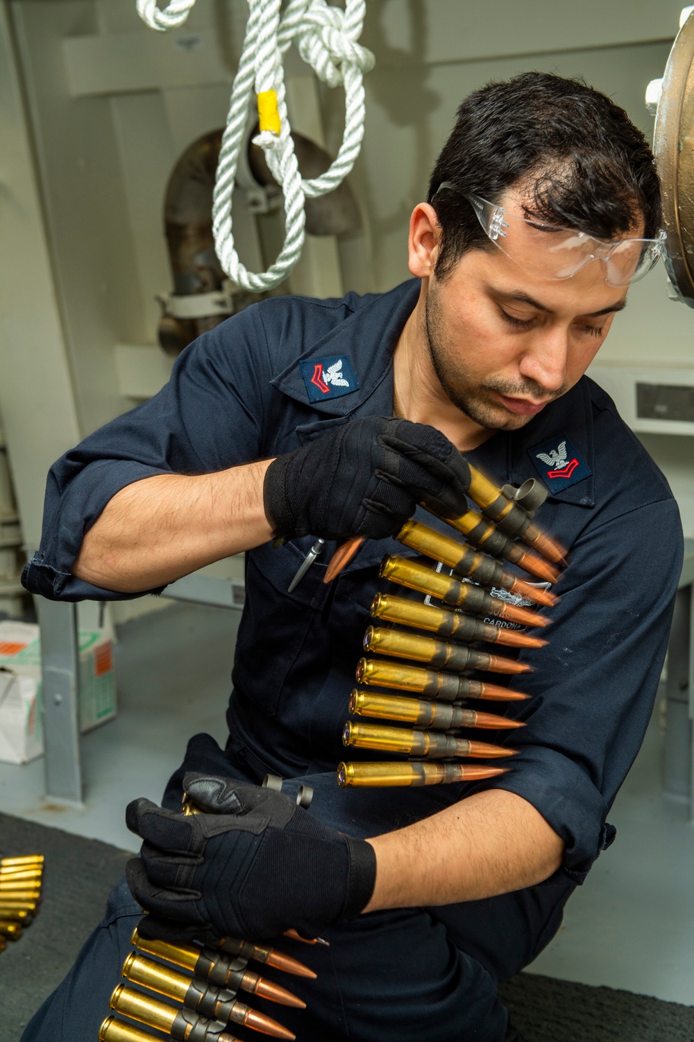 Sailors Prepares Ammunition for .50-Caliber
