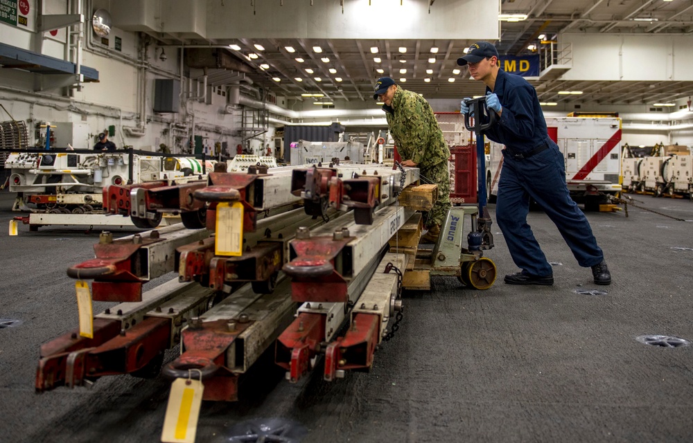 Sailors Move Supplies