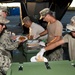 NMCB 1 Sailors and 303rd MEB Soldiers Serve Dinner During Recovery Efforts in Tinian