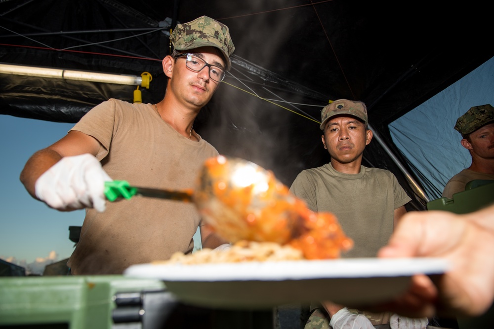 NMCB 1 and 303rd MEB Serve Dinner During Recovery Efforts in Tinian