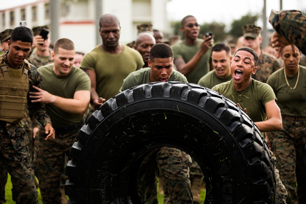 Marines with 3rd Marine Division compete in a field meet