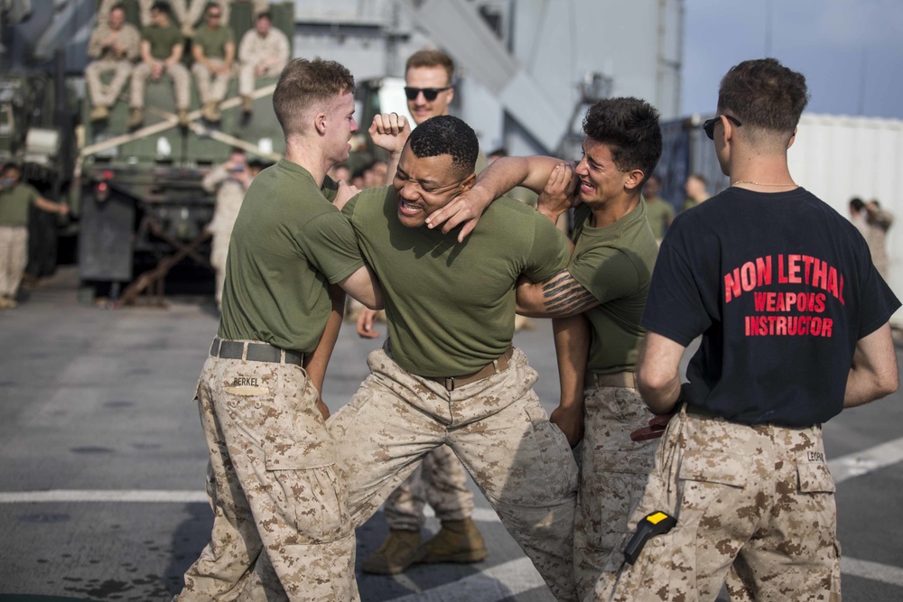 Marines endure the OC Spray Confidence Course