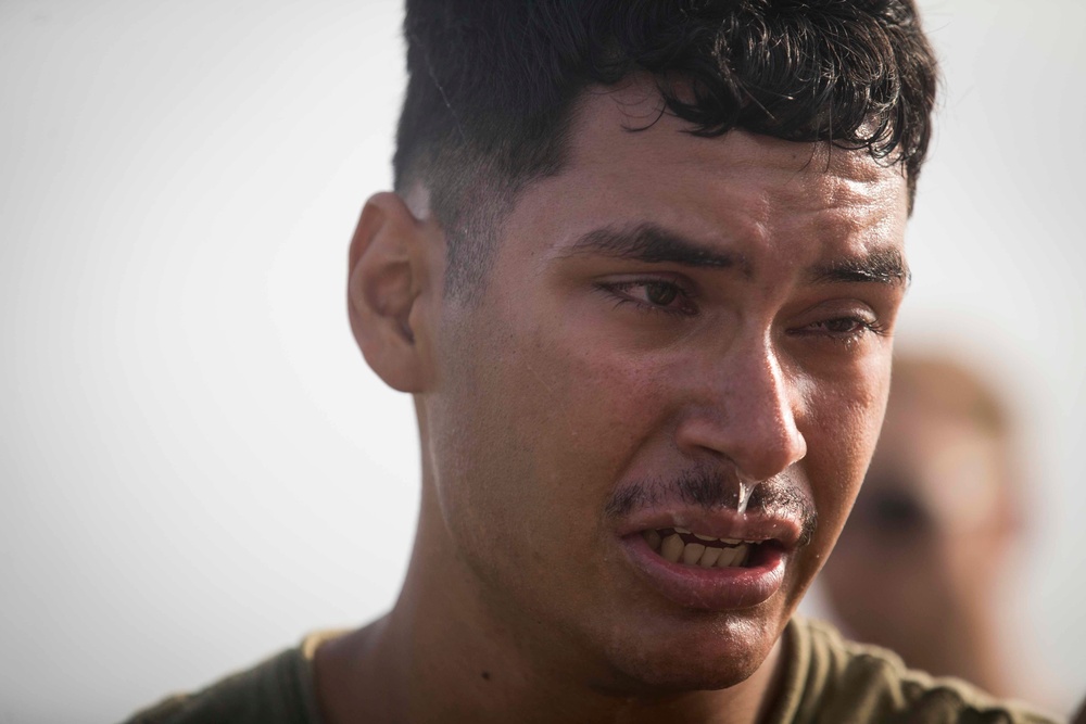 Marines endure the OC Spray Confidence Course