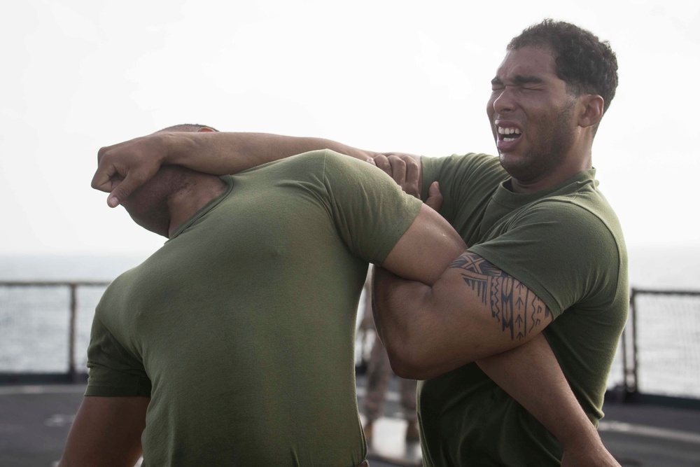 Marines endure the OC Spray Confidence Course