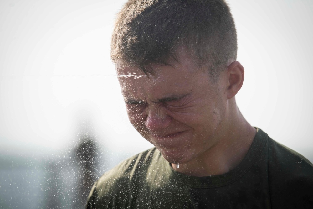 Marines endure the OC Spray Confidence Course