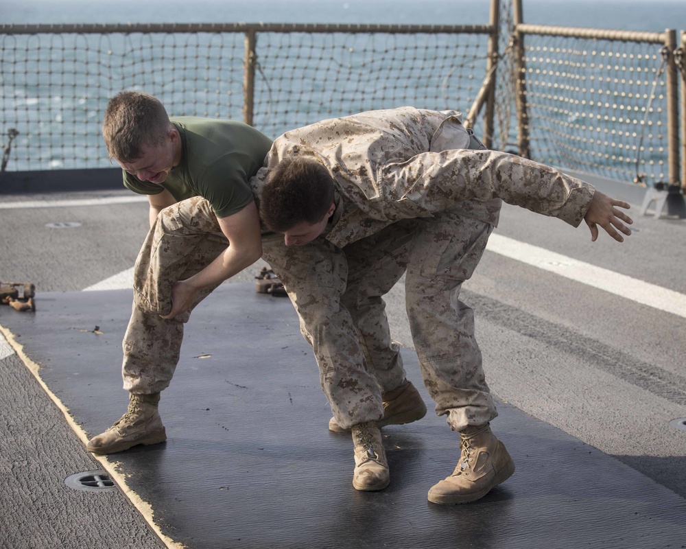 Marines endure the OC Spray Confidence Course