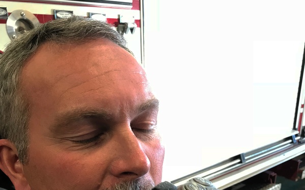 Schriever assistant fire chief shaves mustache for breast cancer awareness