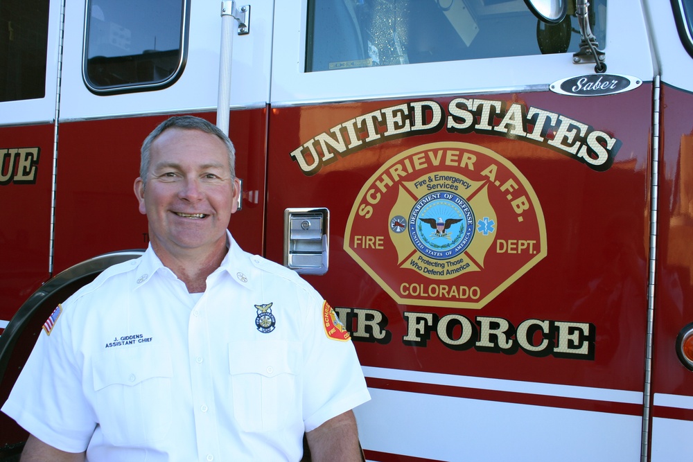 Schriever assistant fire chief shaves mustache for breast cancer awareness