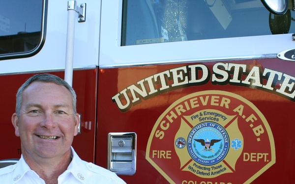 Schriever assistant fire chief shaves mustache for breast cancer awareness