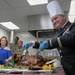 Senior Warrant Officer carves turkey