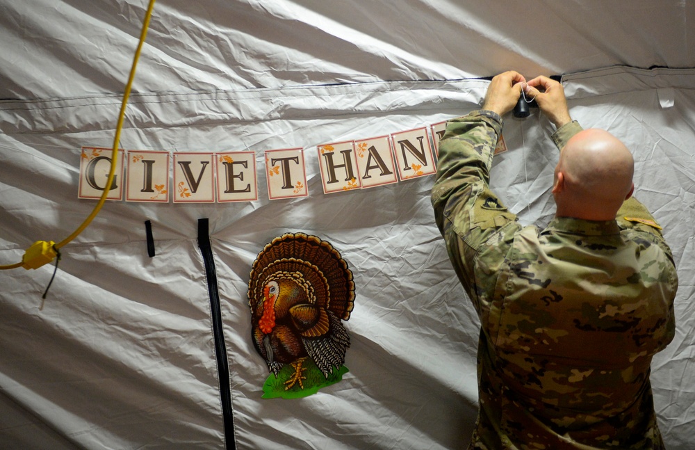 Army Soldiers prepare for Thanksgiving at Camp Donna
