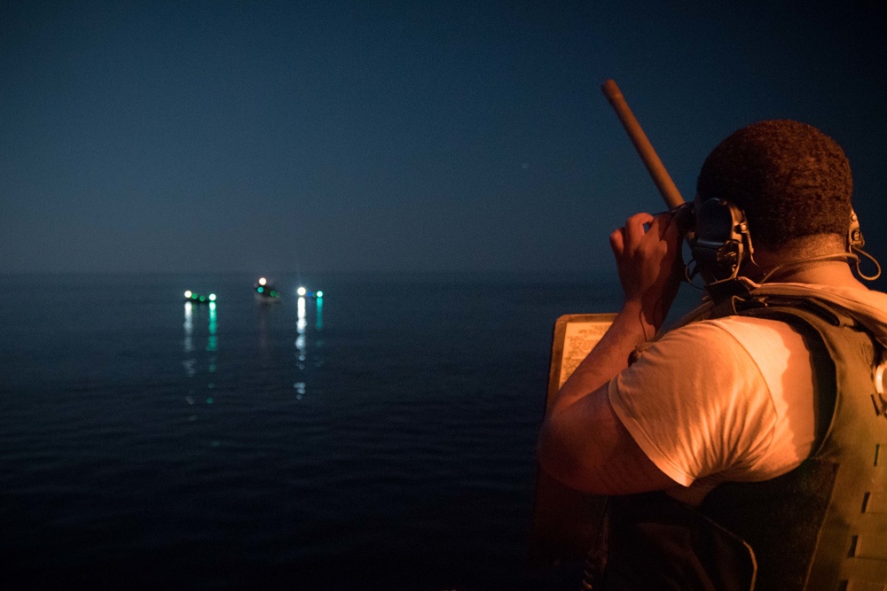 USS Jason Dunham (DDG 109) conducts night maritime security operations