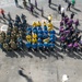 Sailors from the Air department aboard USS John C. Stennis gather into a formation before quarters on the flight deck.