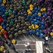 Cmdr. Pavao Huldisch, head of the Air department aboard USS John C. Stennis (CVN 74), addresses Sailors on the flight deck during a department quarters.