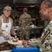 AFCENT leaders serve Thanksgiving meals to service members