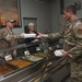 AFCENT leaders serve Thanksgiving meals to service members