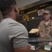 AFCENT leaders serve Thanksgiving meals to service members