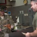 AFCENT leaders serve Thanksgiving meals to service members