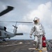 Damage Controlman 3rd Class Sydnie Rodriguez returns to the foul line after refueling an MH-60R Sea Hawk, with Helicopter Maritime Strike Squadron (HSM) 37, aboard USS Chung-Hoon (DDG 93).