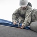 TF Phoenix Airmen repair building roofs