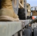 Soldiers load equipment onto trailer