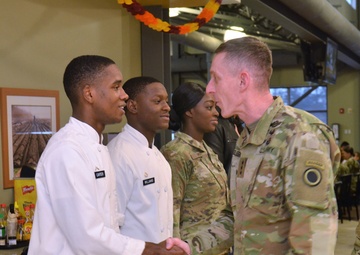 Culinary Specialists from “America’s First Corps” cook all-night long to feed hundreds of Soldiers