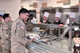 Culinary Specialists from “America’s First Corps” cook all-night long to feed hundreds of Soldiers