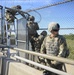 Soldiers Lay Concertina Wire Along Veterans International Bridge