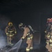Firefighters conduct live fire training, ready to protect their community
