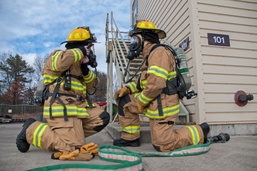 Firefighters conduct live fire training, ready to protect their community