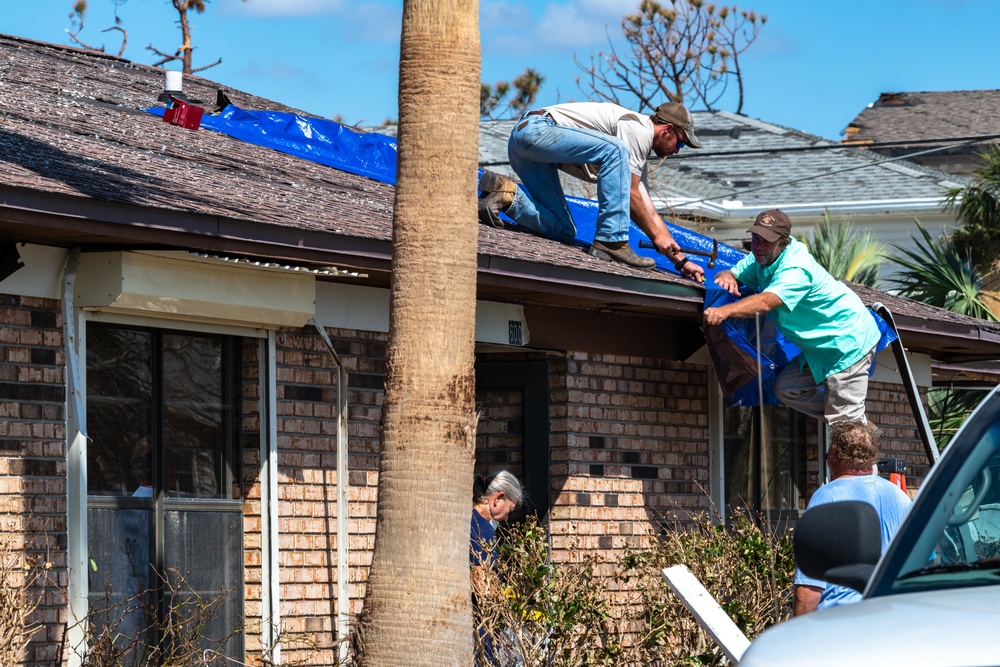 Residents Make Repairs After Hurricane