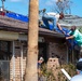 Residents Make Repairs After Hurricane