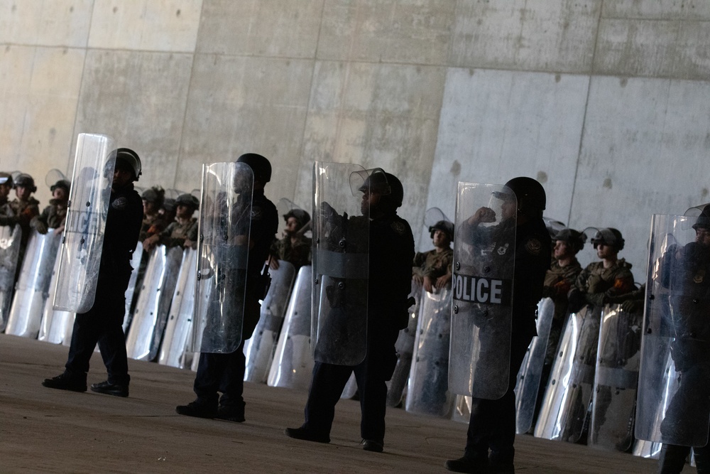 U.S. Soldiers and Marines Practice Non-Lethal Crowd Control Drills