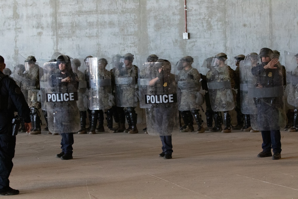 U.S. Soldiers and Marines Practice Non-Lethal Crowd Control Drills