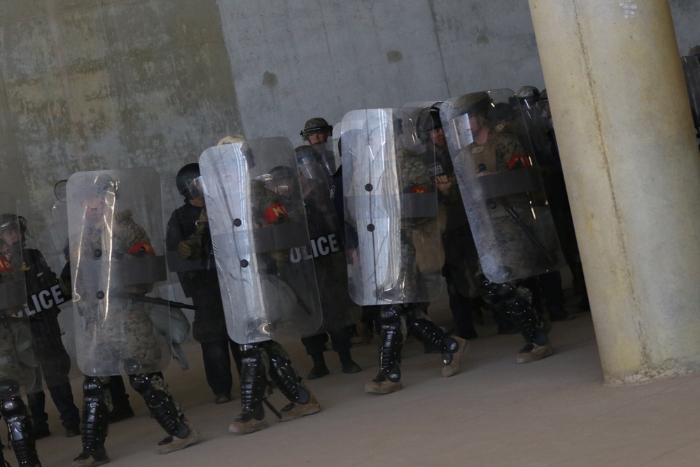 U.S. Soldiers and Marines Practice Non-Lethal Crowd Control Drills