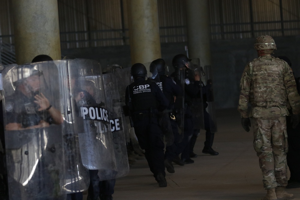 U.S. Soldiers and Marines Practice Non-Lethal Crowd Control Drills