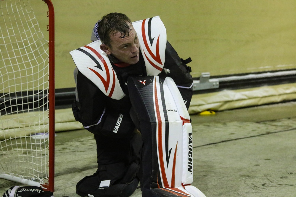 U.S. Soldiers play street hockey with Canadian forces