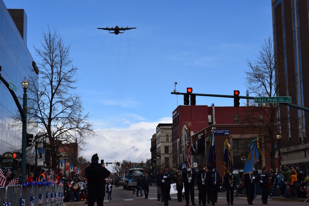 302nd AW flies over Veterans Day parade downtown