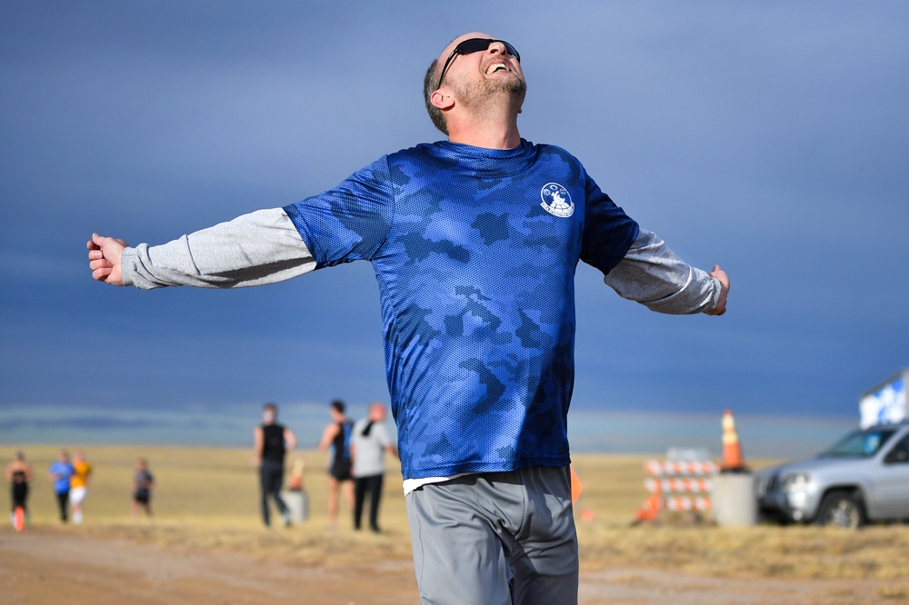 Airmen trot towards finish line
