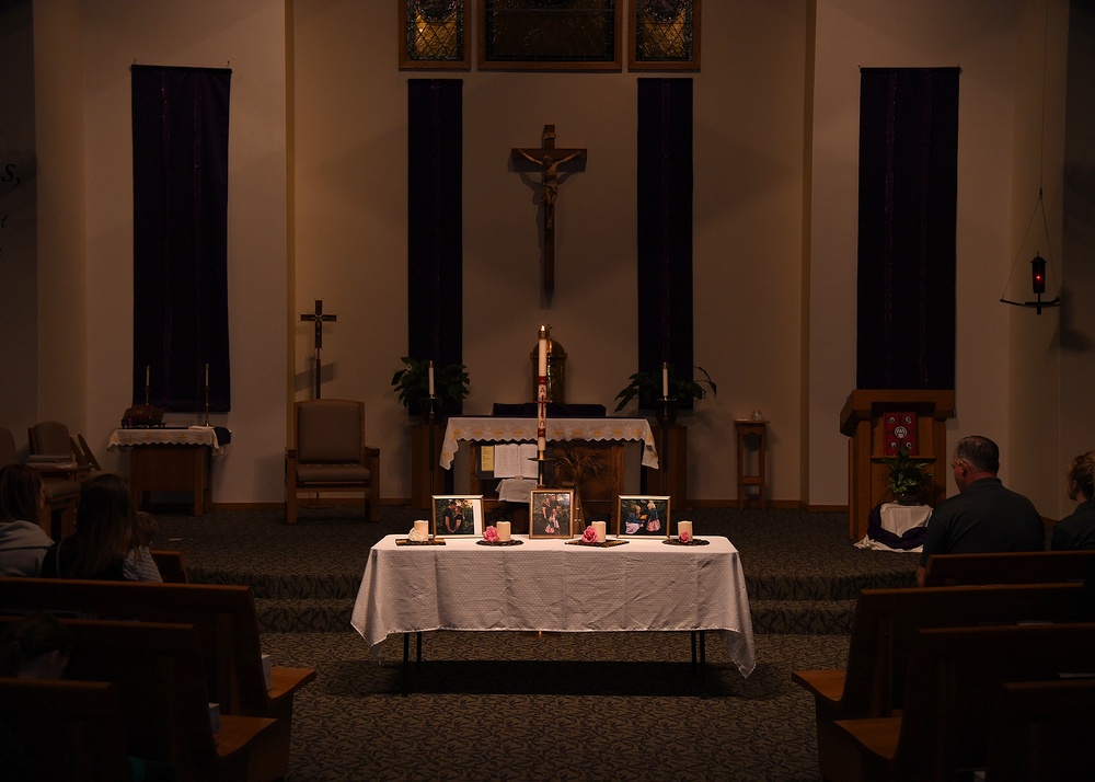 Vigil hosted for Air Force family who died in a vehicle accident