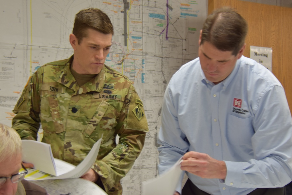 Buffalo District Commander Jason A. Toth and Kenneth Podsiadlo review meeting notes at VA Canandaigua