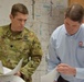 Buffalo District Commander Jason A. Toth and Kenneth Podsiadlo review meeting notes at VA Canandaigua