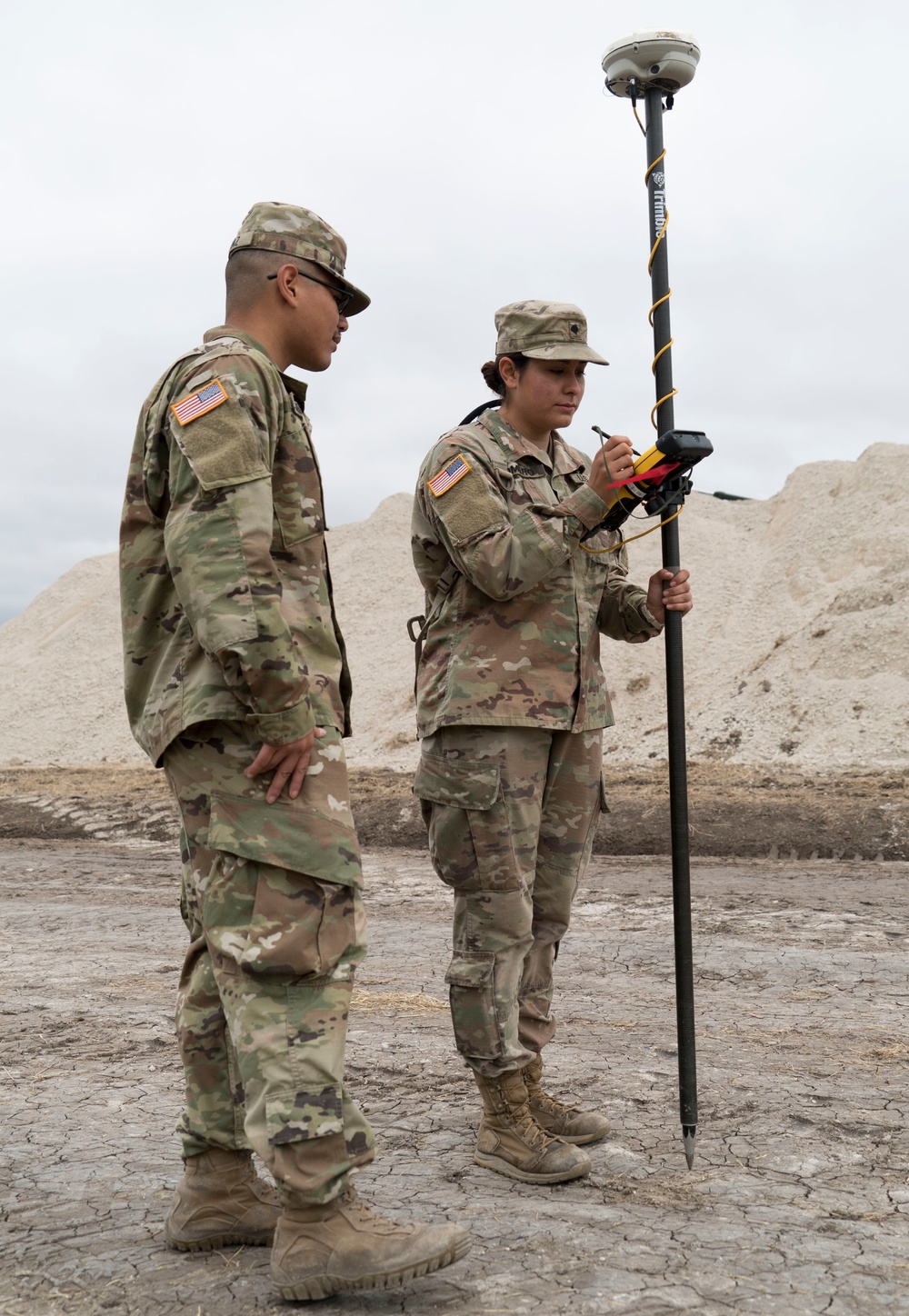 Engineer Soldiers Stakeout a Roadway for Improvements